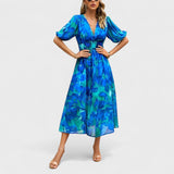Clara - Vestido Médio Floral Elegante