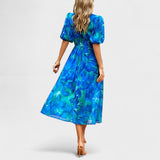 Clara - Vestido Médio Floral Elegante