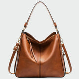 Manuela - Bolsa hobo de couro clássica